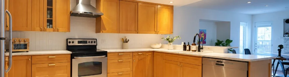 Oak kitchen cabinets before refinishing, by Merner's Painting & Decorating in Houston, TX